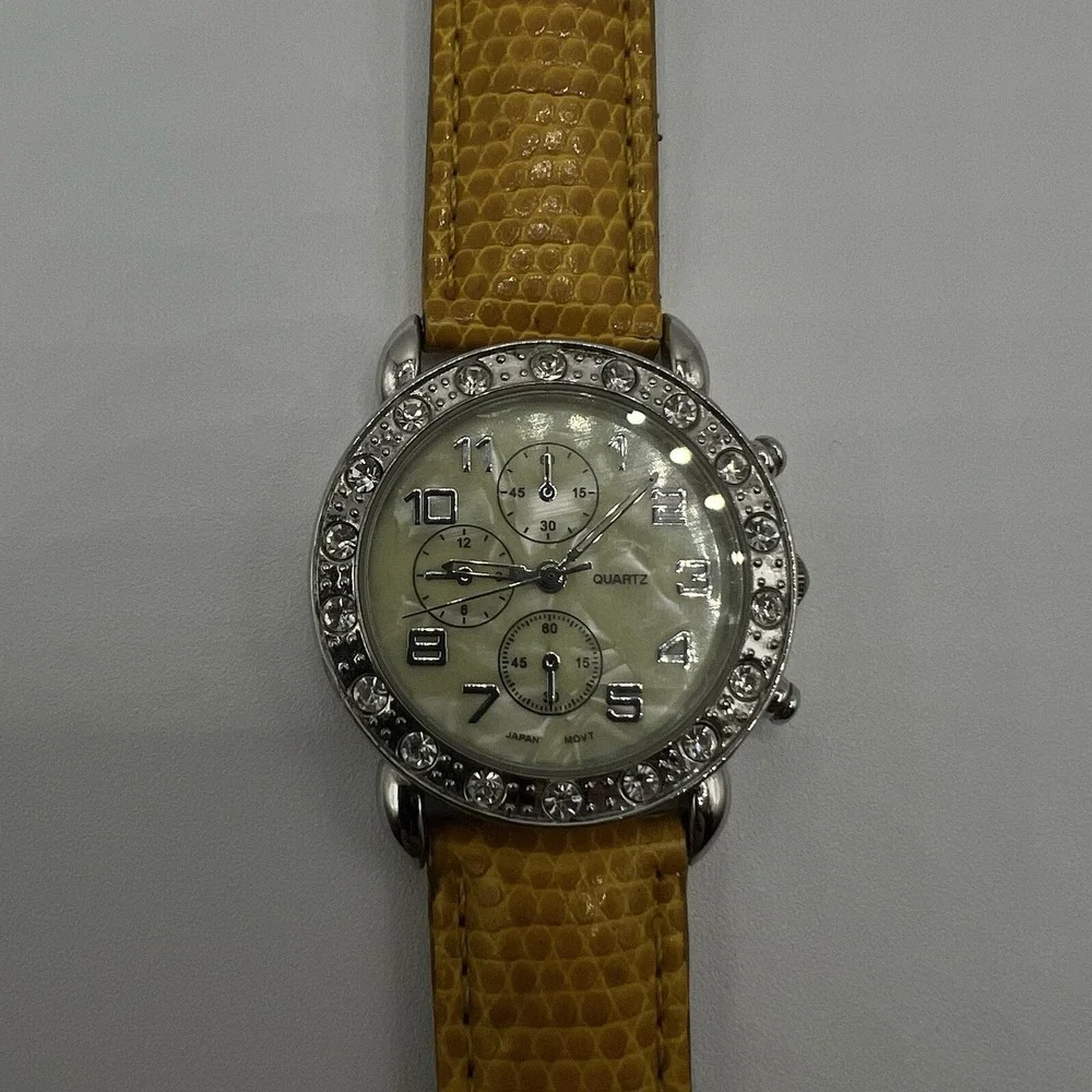 CG Women's Quartz Watch Rhinestone Bezel MOP Dial Plastic Band Needs New Battery